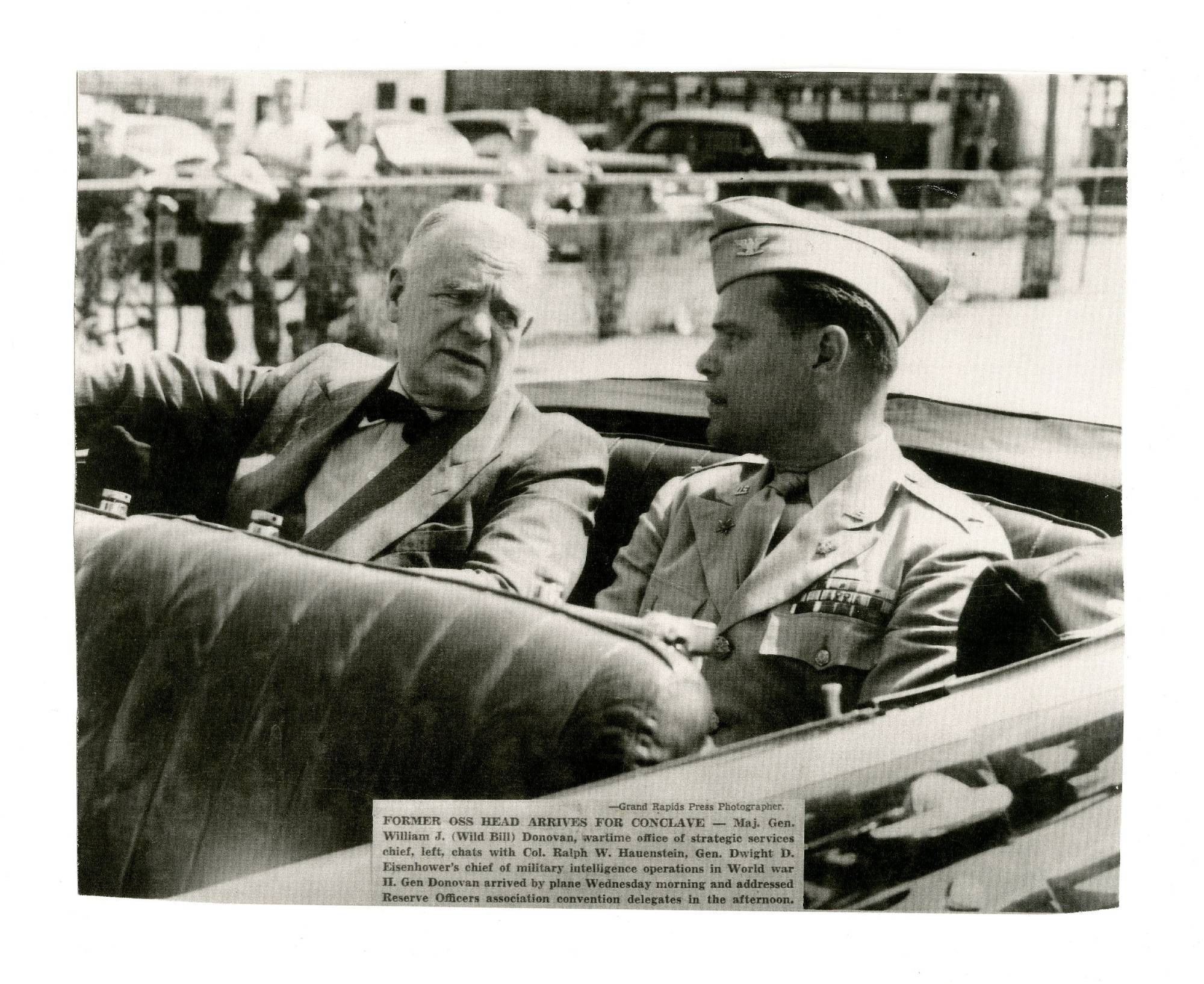 Ralph Hauenstein riding in a car in uniform